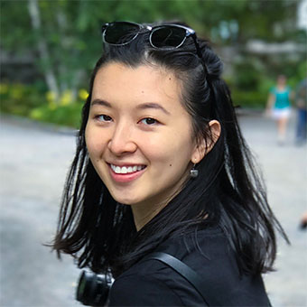 Candice Jiang looks over her left shoulder toward the camera.