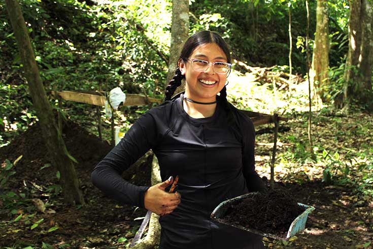 Alex shows off her discoveries in the forest