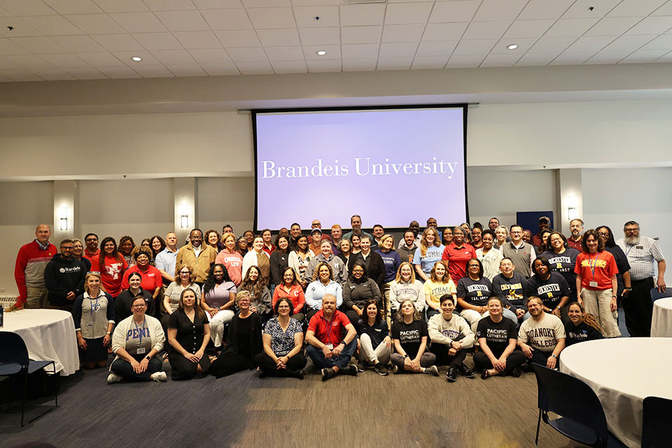 participants lined up in rows for large group photo