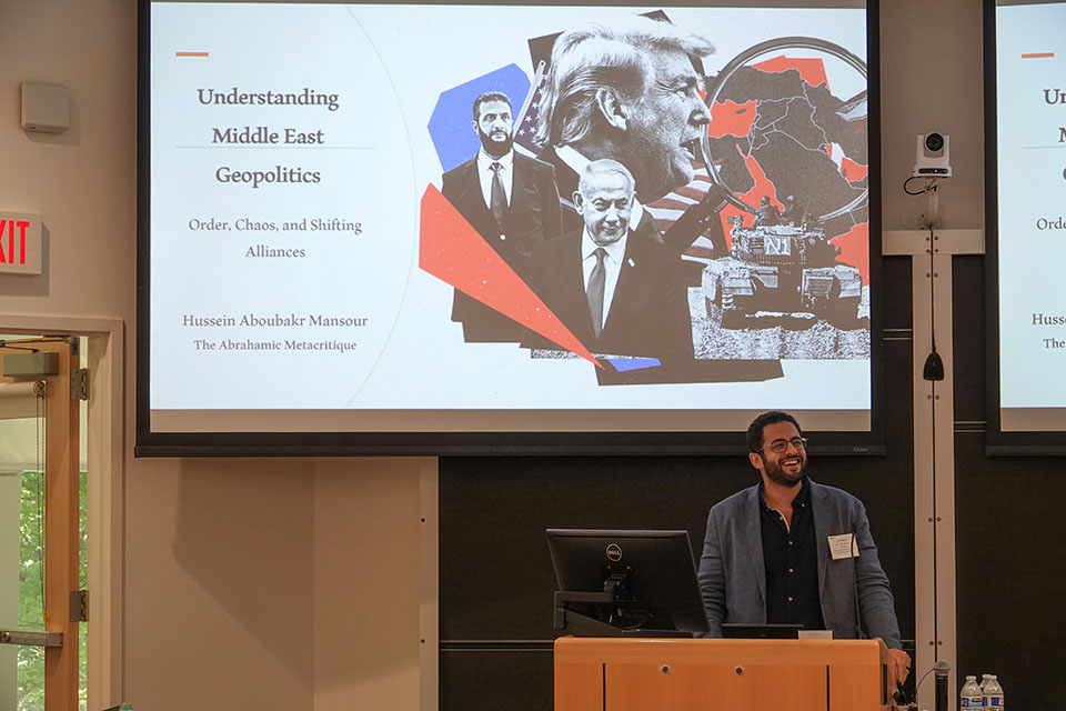 Photo of Hussein Aboubakr Mansour teaching to 2025 Institute cohort.