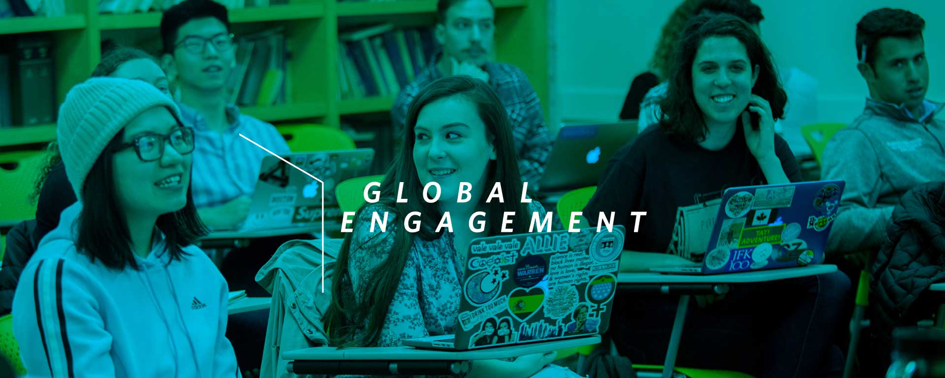 students seated at their desks in classroom, overlaid by words global engagement.