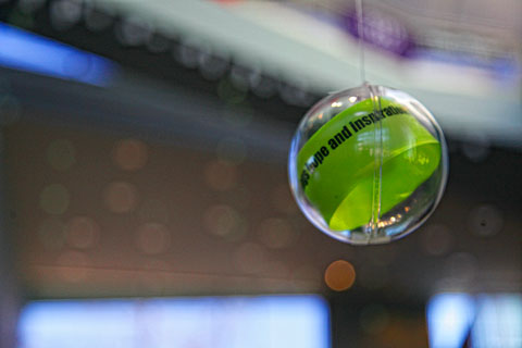 An ornament hangs with a written wish inside at the Shapiro Campus Center Atrium.