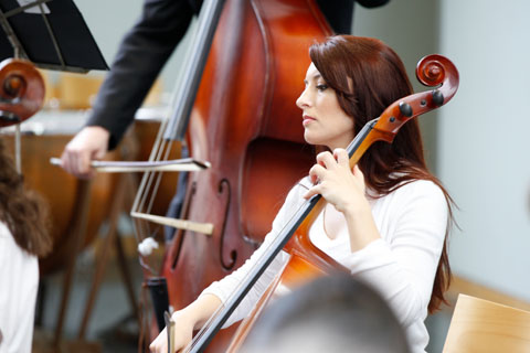 A cellist performing.