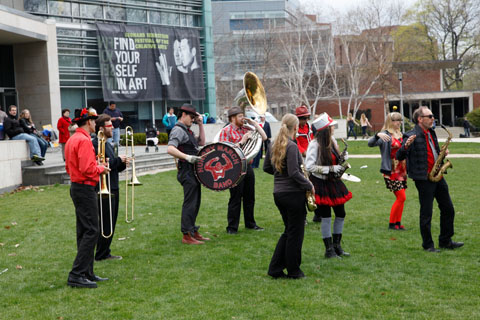 The Hungry March Band preparing to start a performance in front of the Shapiro Campus Center.