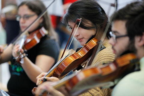 Violinists performing.