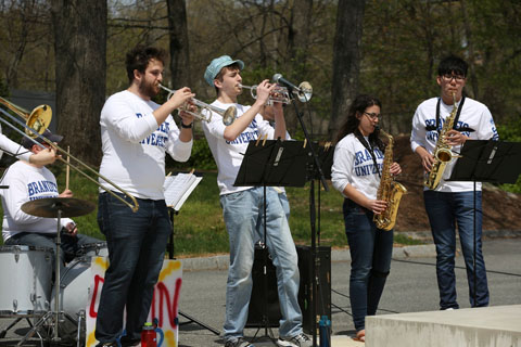 Brandeis' DAMN Band (Dance and Music Nation) performs outside
