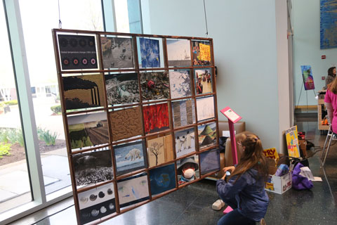 Display with images from "ECO-PANES: VISIONS OF CLIMATE CHANGE"