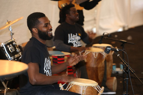 Kotoko Brass percussionists drumming.