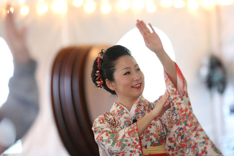 Master dancer Michiko Kurata during her workshop, dancing bon odori, a lively Japanese folk dance.