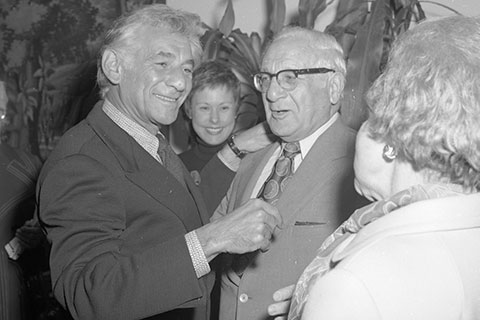 Bernstein smiling at Thelma Sachar
