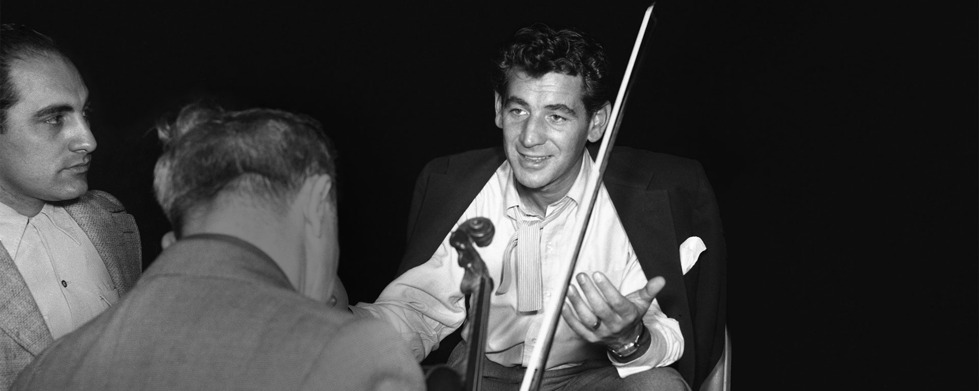 Bernstein talking to two musicians