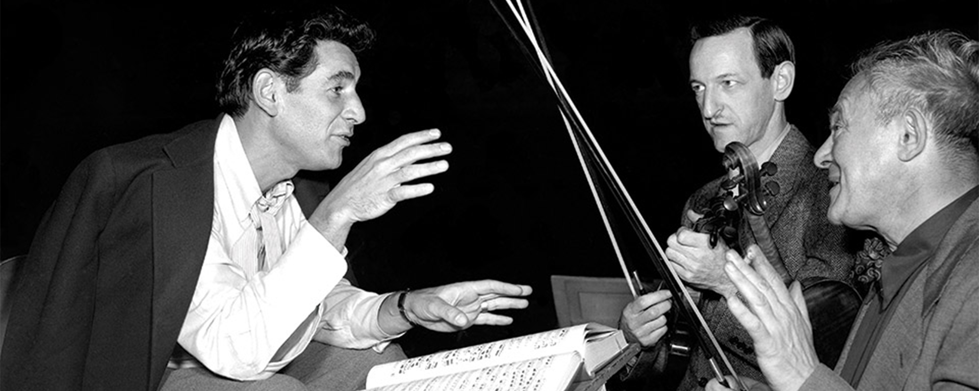 Leonard Bernstein (left) rehearses at Brandeis for the Festival of the Arts with members of the Boston Symphony Orchestra, 1952.