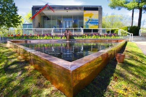 Exterior of Rose Art Museum with copper lined pond 