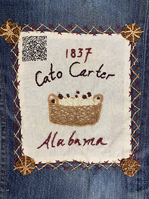 Sewn patch with the name Cato Carter