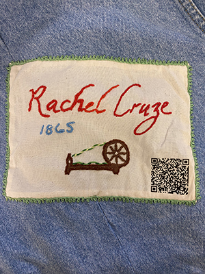 Sewn patch with the name Rachel Cruze