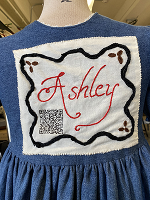 Sewn patch with the name Ashley