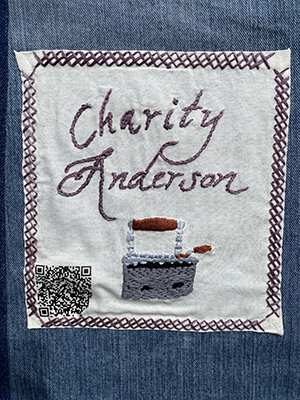 Sewn patch with the name Charity Anderson