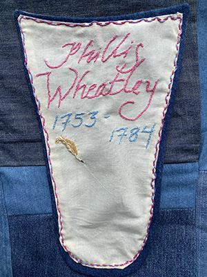 Embroidered patch with Phillis Wheatle's name