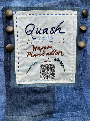 Sewn patch with the name Quash