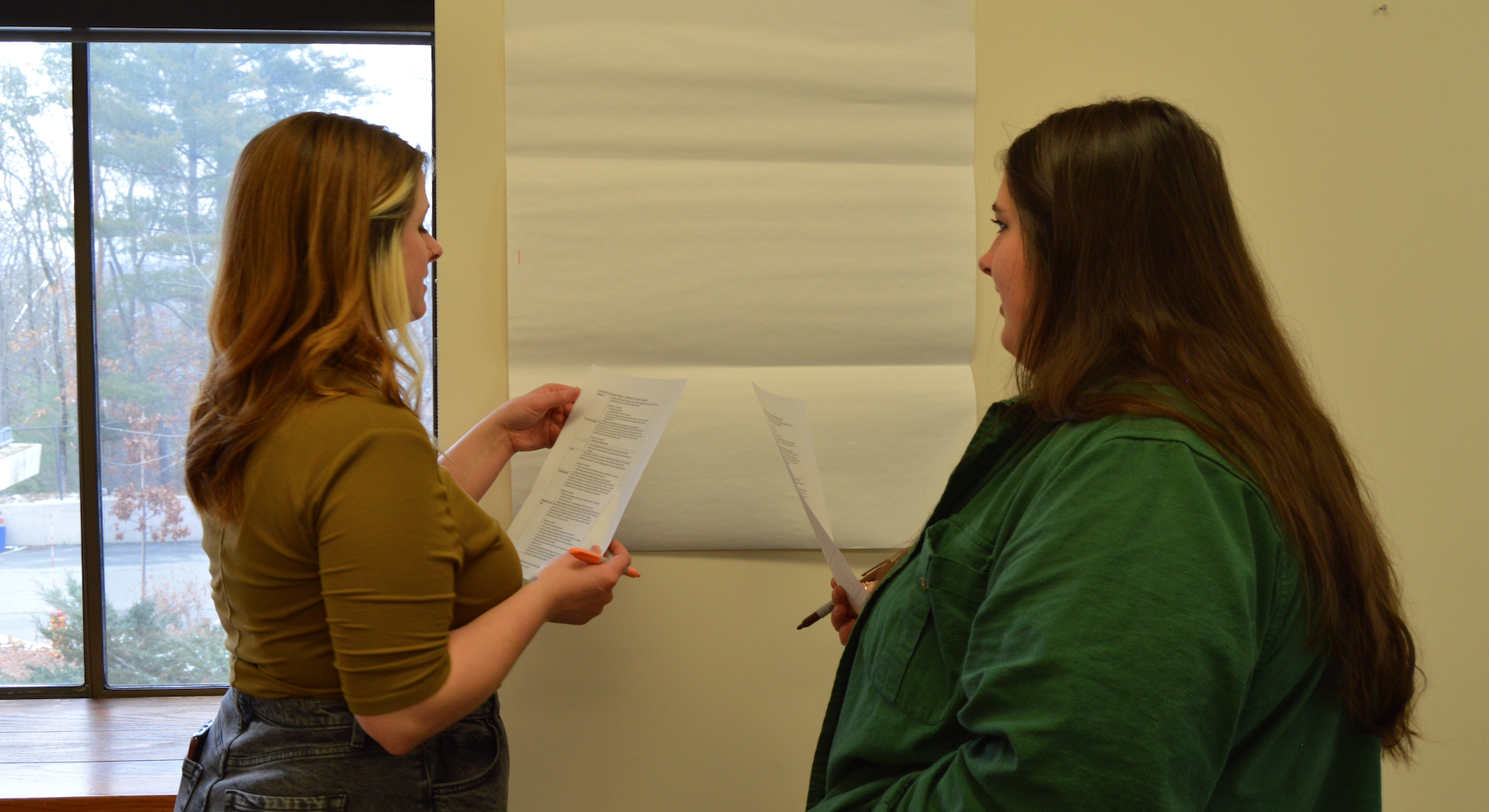 Liz Peterson and Jessi Brewer (PEP Program Director) working on an activity at the Spring 2023 PEP training session.