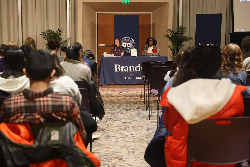 Professor Williams, answering student questions at the Brandeis University Press event: Unlocking Education panel. Photo credit: Efosa Ologbosere.