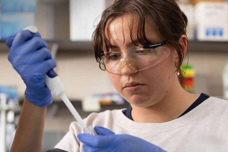 Elena Amado working in a lab.