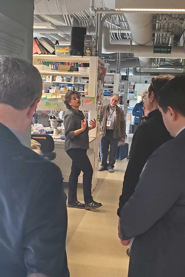 BNC members and staff tour a lab on campus