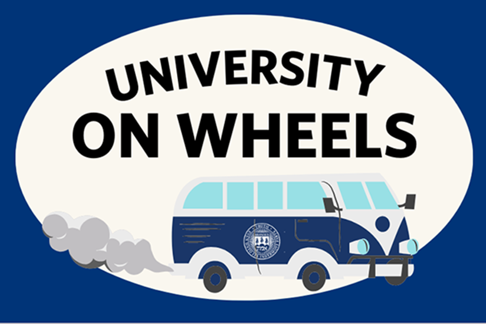 blue school bus with text University on Wheels