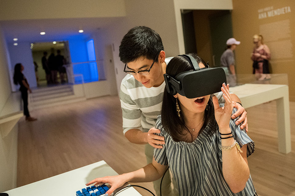 Students at the Rose Art museum, one wearing AI glasses