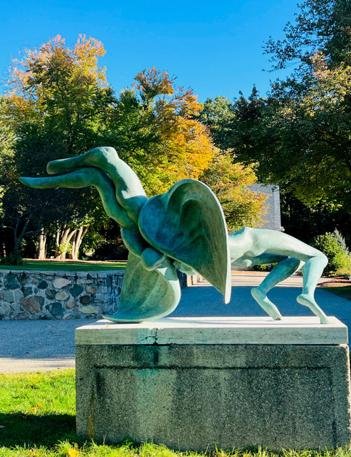 statue of a man and angel wrestling 