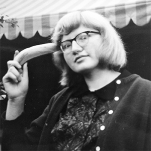 Picture of Luise Pusch in black and white holding a banana to her head