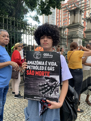 Picture of someone holding a sign at a protest