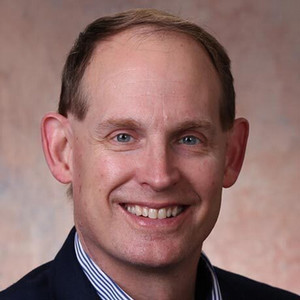 Head shot of Michael S. Bryant smiling