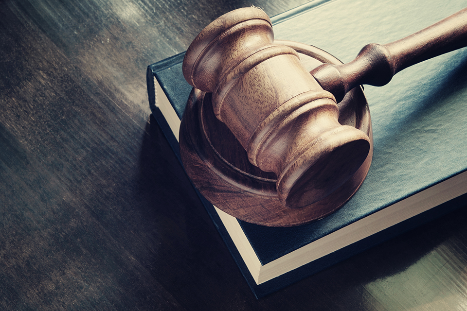 Gavel on top of a wood desk