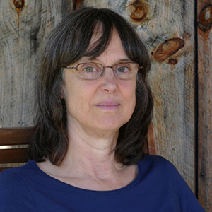 Headshot of deborah in a blue shirt