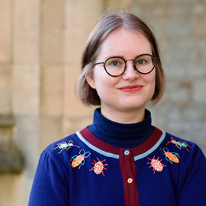 Head shot of Karolina Watroba looking at the camera with a soft smile
