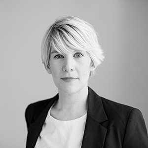 Black and white photo of Carolan smiling