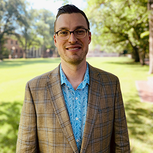 Headshot of James McSpadden smiling