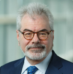 Head shot of Gary looking seriously at the camera