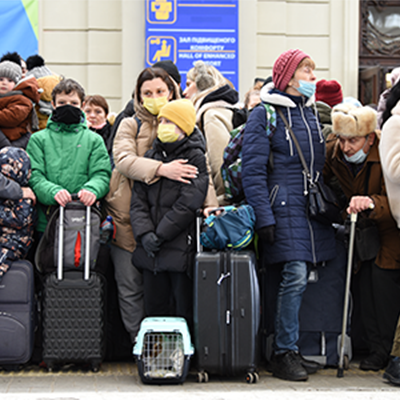 Refugees waiting at a train station