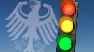 image of a traffic light with the German eagle in the background