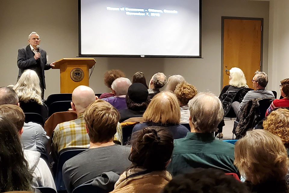 Hans Fischer delivering a lecture