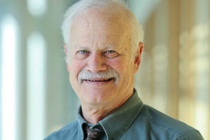 Headshot of Stephen smiling