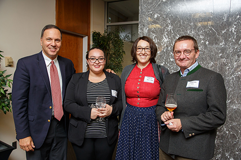 President Ron Liebowitz, Theresa Weis '20, Angelika Weis-Amon and Johannes Weis at the reception, posing for a pciture