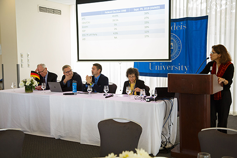 Professor Lucy Goodhart speaking from the podium. 