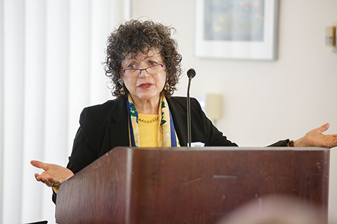 Panelist Viven Schmidt speaking at a panel discussion