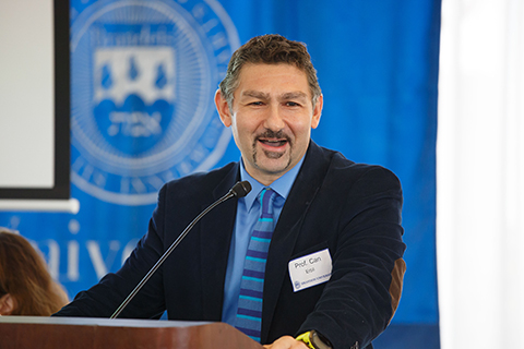 Professor Can Erbil speaking during a panel discussion