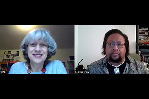 Picture of two speakers hosting a Zoom webinar