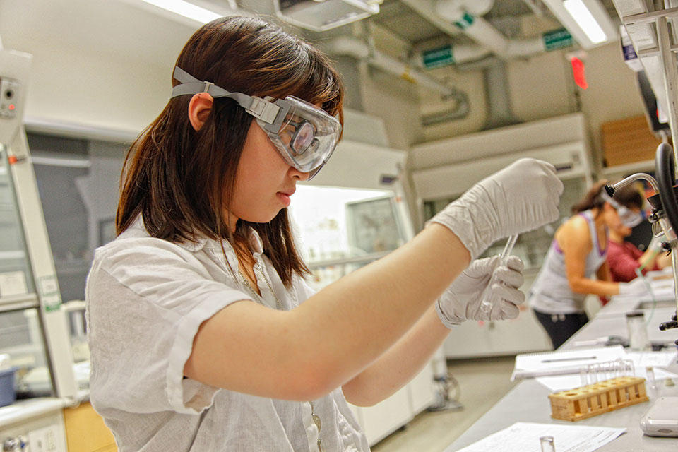 Undergraduate Chemistry student in a lab