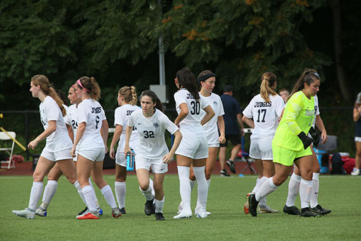 Soccer players on a soccer field